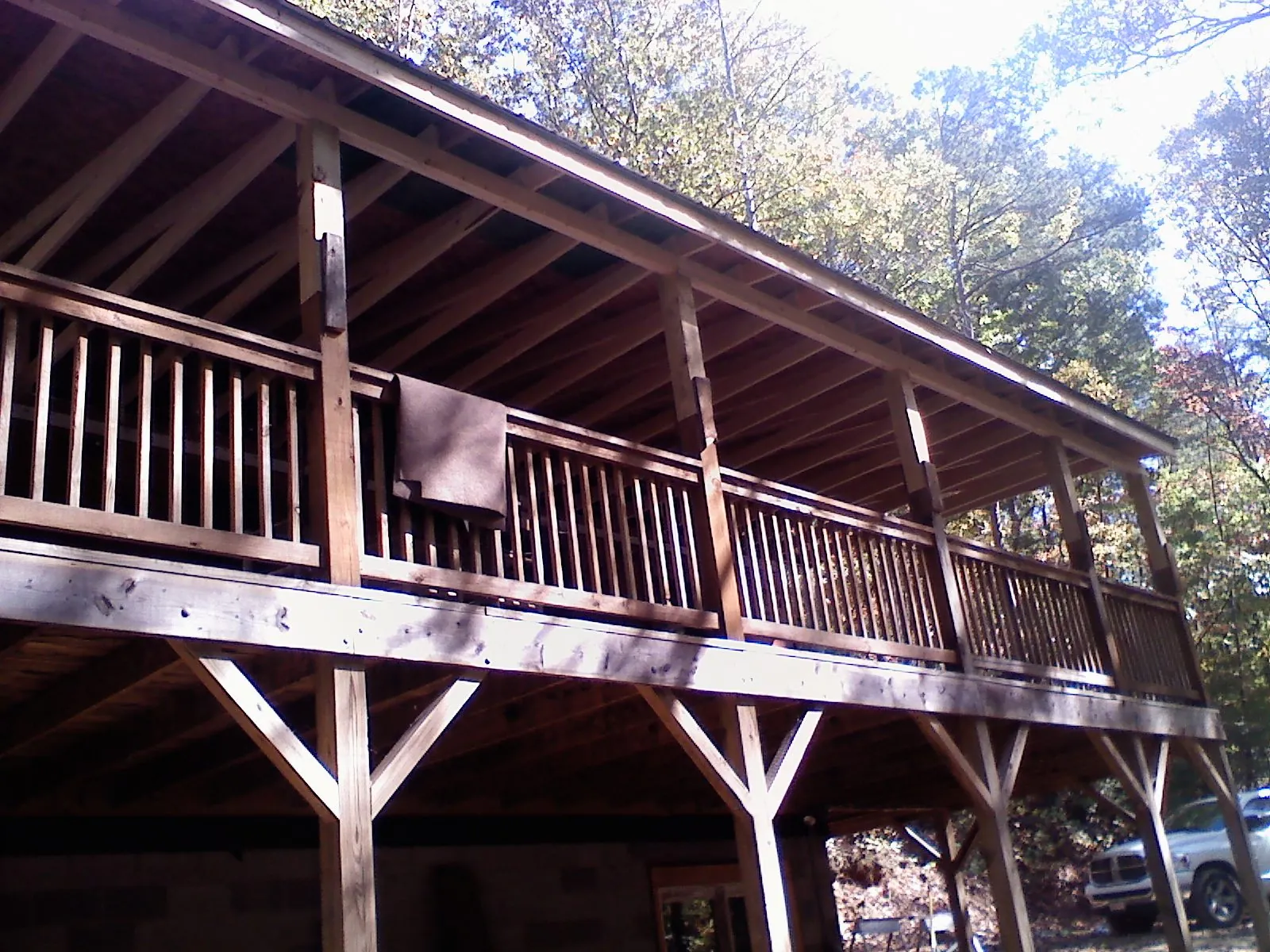 Timber framing under a new elevated porch and deck — Roof Leak Repair in Fayette City by Roofing Brothers